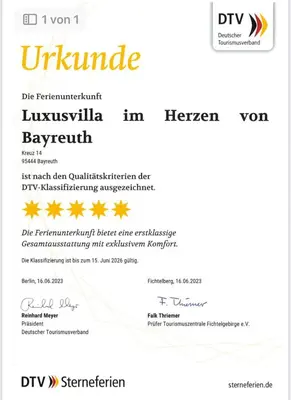 Ein Zertifikat, Auszeichnung, Logo oder anderes Dokument, das in der Unterkunft Villa Johner ausgestellt ist