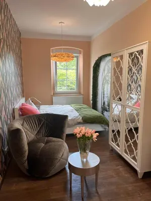 Ein Bett oder Betten in einem Zimmer der Unterkunft Villa Johner