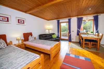 Ein Bett oder Betten in einem Zimmer der Unterkunft Ferienwohnungen Am Sonnenhang