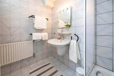 Ein Badezimmer in der Unterkunft Ferienwohnungen Am Sonnenhang