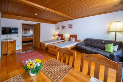 Ein Bett oder Betten in einem Zimmer der Unterkunft Ferienwohnungen Am Sonnenhang