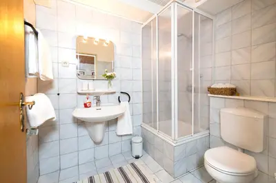 Ein Badezimmer in der Unterkunft Ferienwohnungen Am Sonnenhang
