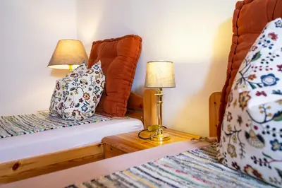 Ein Bett oder Betten in einem Zimmer der Unterkunft Ferienwohnungen Am Sonnenhang