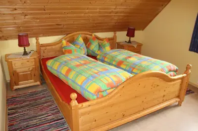 Ein Bett oder Betten in einem Zimmer der Unterkunft Grießlhof