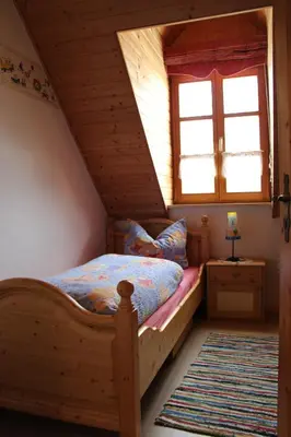 Ein Bett oder Betten in einem Zimmer der Unterkunft Grießlhof