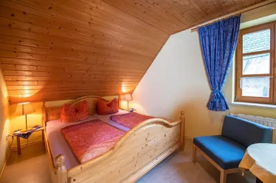 Ein Bett oder Betten in einem Zimmer der Unterkunft Grießlhof