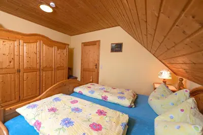 Ein Bett oder Betten in einem Zimmer der Unterkunft Grießlhof