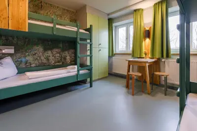 Ein Bett oder Betten in einem Zimmer der Unterkunft Jugendherberge Furth im Wald