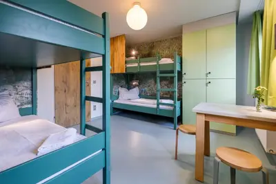 Ein Bett oder Betten in einem Zimmer der Unterkunft Jugendherberge Furth im Wald