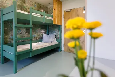Ein Bett oder Betten in einem Zimmer der Unterkunft Jugendherberge Furth im Wald