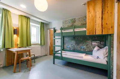 Ein Bett oder Betten in einem Zimmer der Unterkunft Jugendherberge Furth im Wald