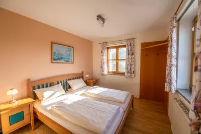 Ein Bett oder Betten in einem Zimmer der Unterkunft Scheidlerhof
