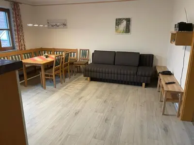 Ein Sitzbereich in der Unterkunft Scheidlerhof