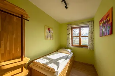 Ein Bett oder Betten in einem Zimmer der Unterkunft Scheidlerhof