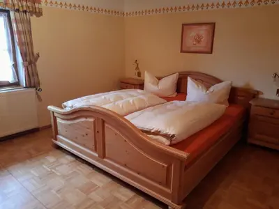 Ein Bett oder Betten in einem Zimmer der Unterkunft Wofahanslhof