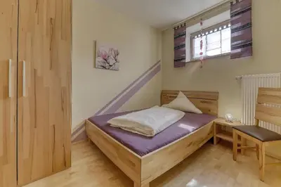 Ein Bett oder Betten in einem Zimmer der Unterkunft Wofahanslhof