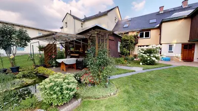 Ein Garten an der Unterkunft Ferienwohnung Wild