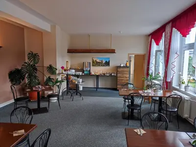 Ein Restaurant oder anderes Speiselokal in der Unterkunft Pension Wernesgrün