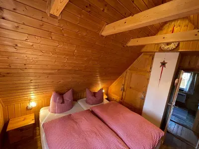 Ein Bett oder Betten in einem Zimmer der Unterkunft Berghütte Fichtelstreich