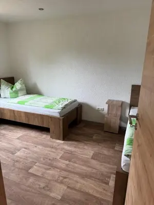Ein Bett oder Betten in einem Zimmer der Unterkunft Ferienwohnung Zeitler