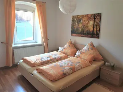 Ein Bett oder Betten in einem Zimmer der Unterkunft Ferienwohnungen 