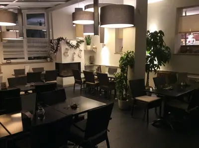 Ein Sitzbereich in der Unterkunft Hotel Konditorei Cafe Dora