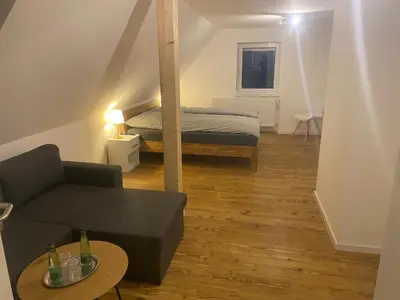 Ein Bett oder Betten in einem Zimmer der Unterkunft Hotel Konditorei Cafe Dora