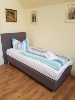 Ein Bett oder Betten in einem Zimmer der Unterkunft Haus 