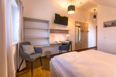 Ein Bett oder Betten in einem Zimmer der Unterkunft Familiengasthof Schaller
