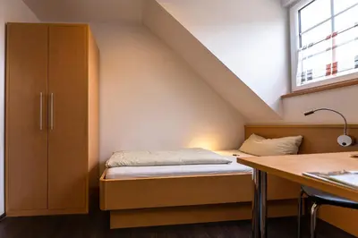 Ein Bett oder Betten in einem Zimmer der Unterkunft Familiengasthof Schaller
