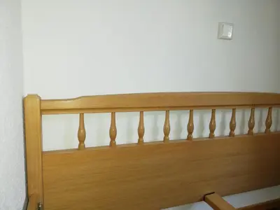Ein Bett oder Betten in einem Zimmer der Unterkunft Ferienhaus Kaufmanns Cafe