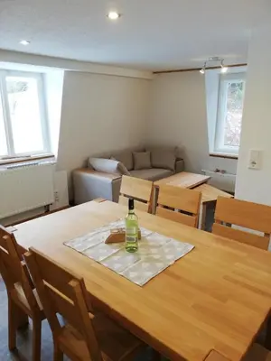 Ein Sitzbereich in der Unterkunft Ferienhaus Kaufmanns Cafe