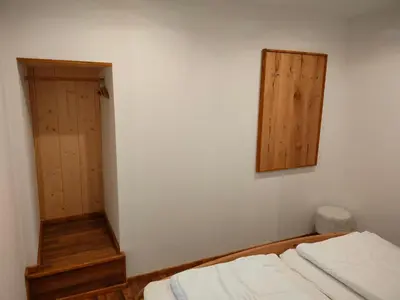 Ein Bett oder Betten in einem Zimmer der Unterkunft Ferienhaus Kaufmanns Cafe