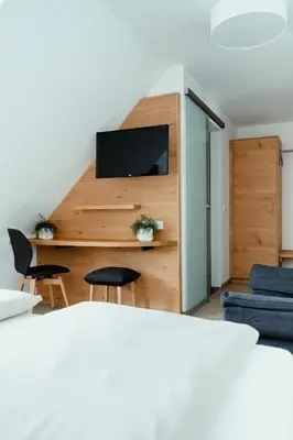 Ein Bett oder Betten in einem Zimmer der Unterkunft Kondrauer Hof