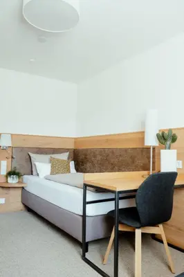 Ein Bett oder Betten in einem Zimmer der Unterkunft Kondrauer Hof