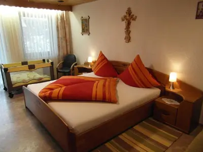 Ein Bett oder Betten in einem Zimmer der Unterkunft Schönberger-Hof