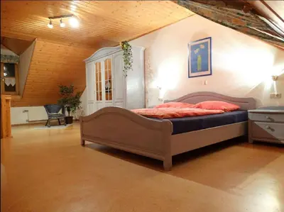Ein Bett oder Betten in einem Zimmer der Unterkunft Schwarz-Hof