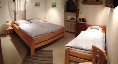 Ein Bett oder Betten in einem Zimmer der Unterkunft Ferienwohnung Boller I für 5 Personen