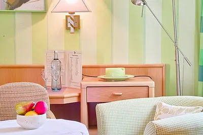 Ein Sitzbereich in der Unterkunft Hotel Falter