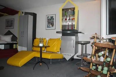Ein Sitzbereich in der Unterkunft City-Hotel