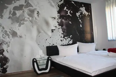 Ein Bett oder Betten in einem Zimmer der Unterkunft City-Hotel