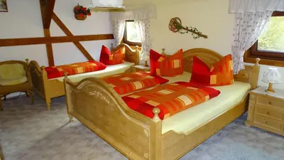 Ein Bett oder Betten in einem Zimmer der Unterkunft Ferienwohnung Wasserläufer