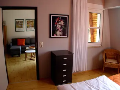 Ein Bett oder Betten in einem Zimmer der Unterkunft Park-Villa, Therme und Kurpark
