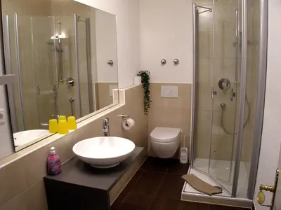 Ein Badezimmer in der Unterkunft Park-Villa, Therme und Kurpark