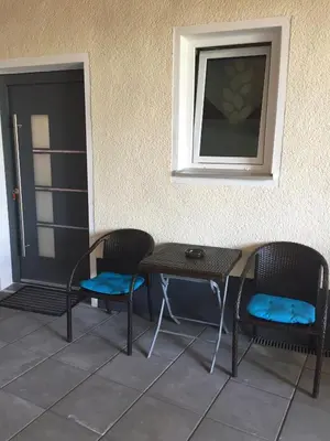 Ein Sitzbereich in der Unterkunft Ferienwohnung am Schloss