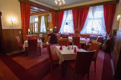 Ein Sitzbereich in der Unterkunft Hotel Central