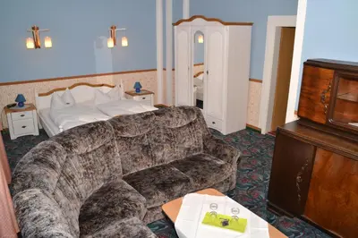 Ein Bett oder Betten in einem Zimmer der Unterkunft Hotel Central