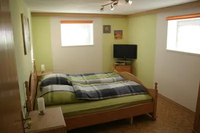 Ein Bett oder Betten in einem Zimmer der Unterkunft Haus am Treffenbach