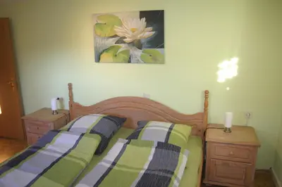 Ein Bett oder Betten in einem Zimmer der Unterkunft Haus am Treffenbach