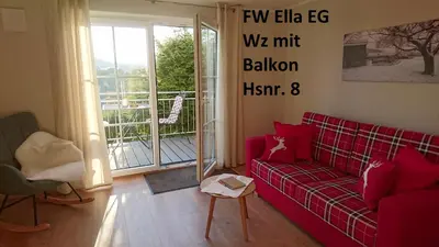 Ein Sitzbereich in der Unterkunft Ferienwohnung Rettinger